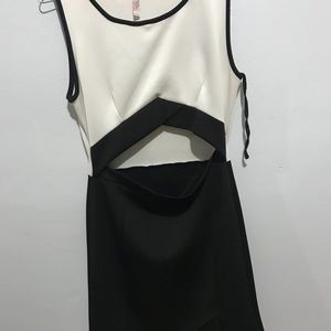 Black and white dress with a cut out in the middle